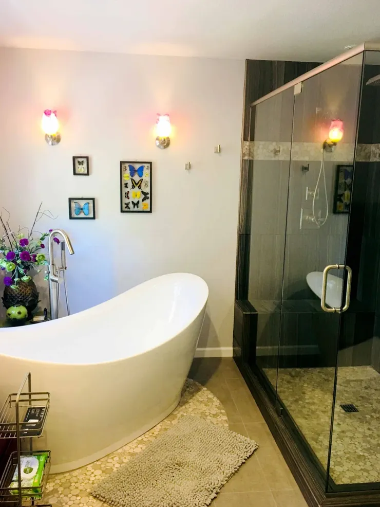 Luxury bathroom with freestanding tub and glass shower