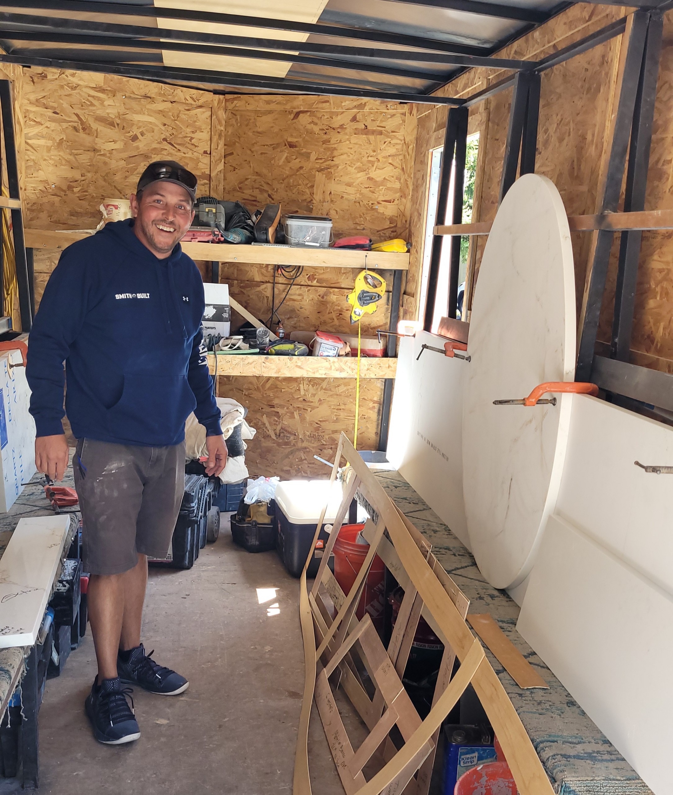 Tyler Smith - Owner of Smith Built in his work trailer